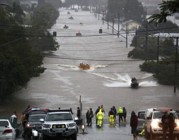 Flash flood triggered by torrential rain kills 20 in Australia; thousands evacuated