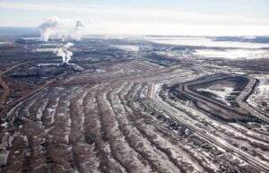 Total to exit Canadian oil lobby group, write down US$8.1 billion in fossil fuel assets